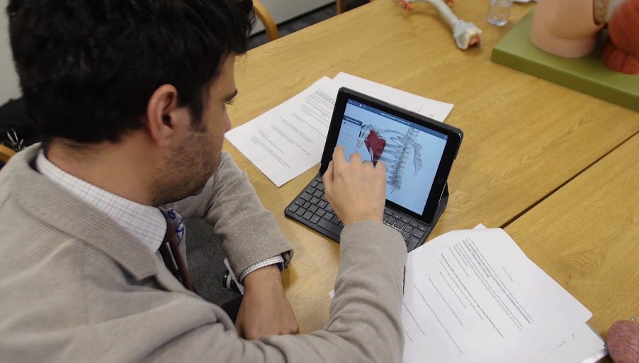 student using Complete Anatomy with iPad